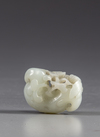 A Chinese white jade carving of a water caltrop