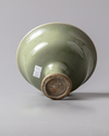 A CHINESE CELADON GLAZED STEM CUP, MING DYNASTY (1368-1644) OR LATER