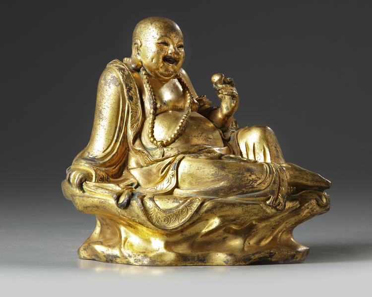 A gilt bronze figure of budai