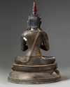A gilt Chinese figure of a buddha