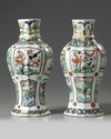A pair of Chinese moulded famille verte vases