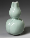 A Chinese celadon-glazed triple-gourd vase