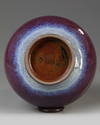A CHINESE FLAMBÉ GLAZED BOTTLE VASE, 19TH-20TH CENTURY