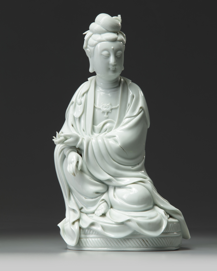 A Chinese white glazed Guanyin