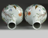 A pair of large Chinese famille rose 'quails' bottle vases, tianqiuping