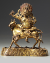 A Sino-Tibetan gilt bronze figure of Palden Lhamo