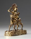 A Sino-Tibetan gilt bronze figure of Palden Lhamo