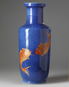 A CHINESE IRON-RED AND GILT DECORATED ROULEAU VASE,19TH-20TH CENTURY
