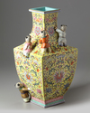 A Chinese lotus yellow ground vase
