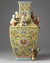 A Chinese lotus yellow ground vase
