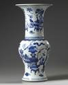 A Chinese blue and white 'precious objects' phoenix tail vase