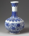 A Chinese blue and white 'scrolling lotus' bottle vase