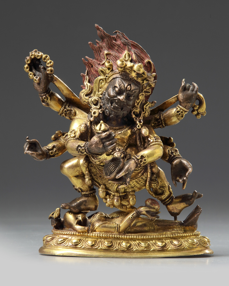 A gilt Sinotibetan bronze figure of mahakala