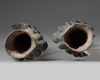 A PAIR OF CHINESE BRONZE PEACOCK CANDLE STICKS, 19TH CENTURY