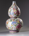 A Chinese famille rose 'millefleurs' double gourd vase