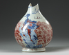 A Chinese copper-red-decorated blue and white 'mythical beasts' vase