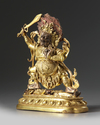 A Sinotibetan gilt bronze figure of mahakala
