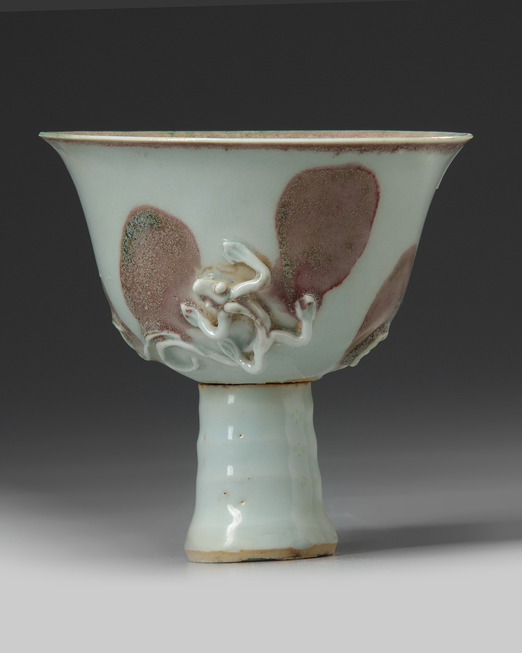 A CHINESE WHITE GLAZED STEM CUP