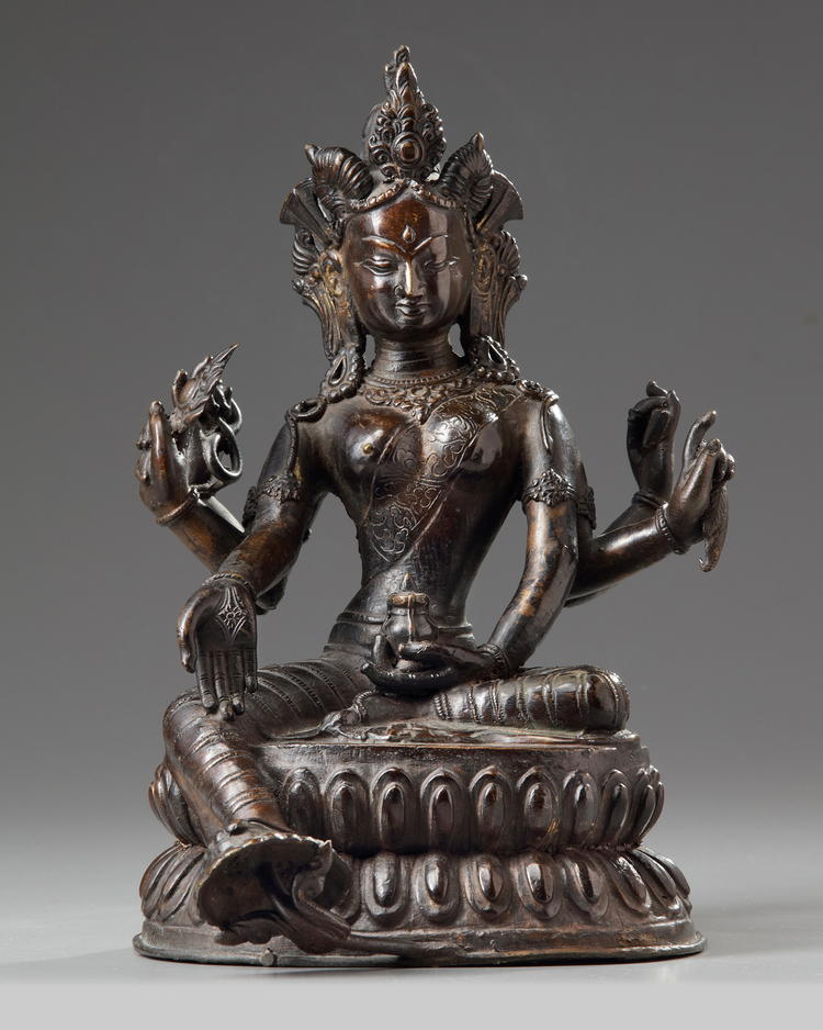 A Nepalese bronze figure of Vasudhara