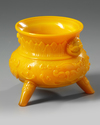 A CHINESE OPAQUE YELLOW GLASS TRIPOD CENSER 