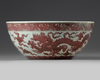 A Chinese underglaze copper-red-decorated 'dragon' bowl