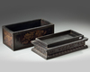 A CHINESE GILT LACQUER-DECORATED RECTANGULAR BOX AND STAND