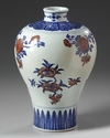 A Chinese underglaze copper red decorated blue and white meiping