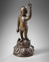 A Chinese bronze figure of the boy Shakyamuni