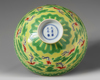 A Chinese yellow and green-enamelled 'bat' bowl with polychrome details
