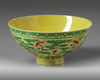 A Chinese yellow and green-enamelled 'bat' bowl with polychrome details