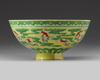 A Chinese yellow and green-enamelled 'bat' bowl with polychrome details