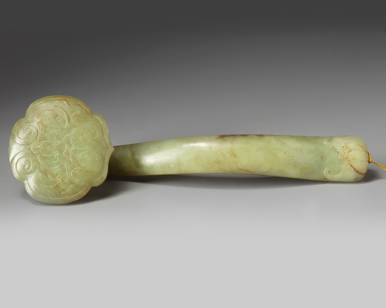 A Chinese celadon jade ruyi sceptre