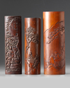A GROUP OF THREE CHINESE CARVED BAMBOO 'SCHOLARS' WRIST RESTS, 20TH CENTURY