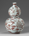 A Chinese underglaze red decorated double gourd vase