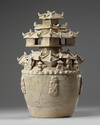 A CHINESE YUE-STYLE CELADON-GLAZED FUNERAL URN, HUNPING 3RD-CENTURY STYLE