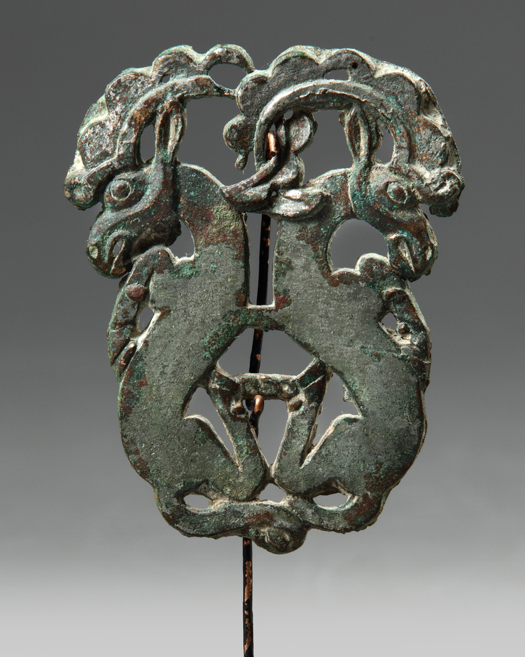 An Ordos bronze 'twin-ibex' fitting