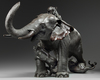 A LARGE JAPANESE BRONZE ELEPHANT AND TIGER GROUP, MEIJI PERIOD (1868-1912)