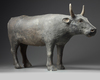 A RARE CHINESE PAINTED POTTERY FIGURE OF AN OX, HAN DYNASTY (206 BC-220 AD)