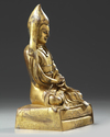 A Chinese gilt bronze figure of a Lama