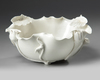 A Chinese white glazed 'lotus' bowl