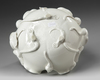 A Chinese white glazed 'lotus' bowl