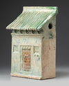 A Chinese green-glazed pottery store house