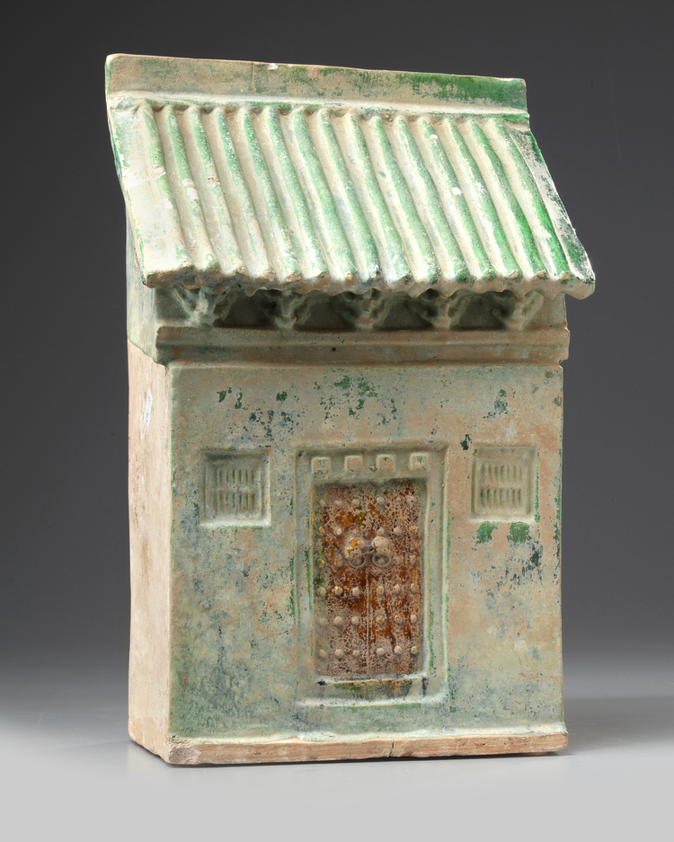 A Chinese green-glazed pottery store house