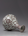 A Chinese underglaze copper-red-decorated pear-shaped vase, yuhuchunping
