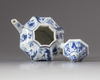 A blue and white hexagonal teapot and cover