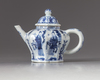 A blue and white hexagonal teapot and cover