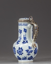 A blue and white silver mounted mik jug