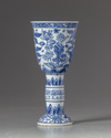 A Chinese blue and white stem beaker