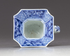 A Chinese blue and white square spittoon