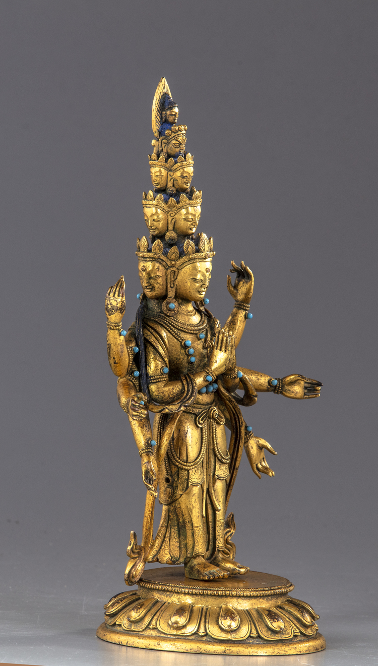 A Sino-Tibetan gilt bronze multi-headed Avalokitesvara